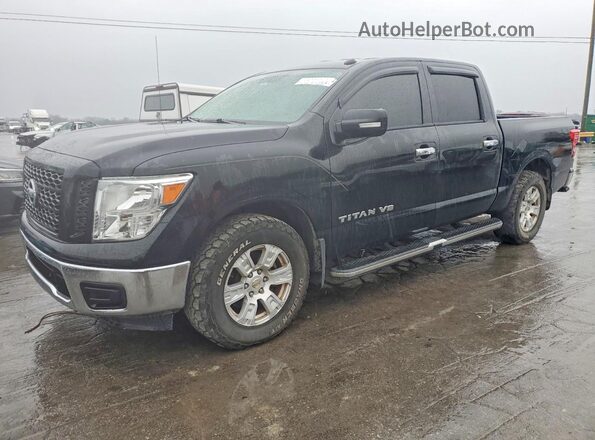 1N6AA1EKXKN523384 2019 NISSAN TITAN Черный Передняя левая четверть