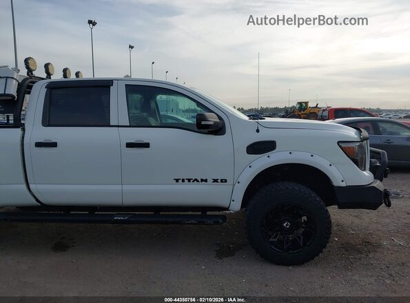 1N6AA1F35JN525775 2018 NISSAN TITAN XD Белый Вид задней части салона