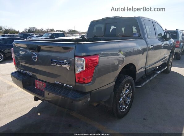 1N6AA1F44JN511973 2018 NISSAN TITAN XD Серебряный Задняя правая четверть
