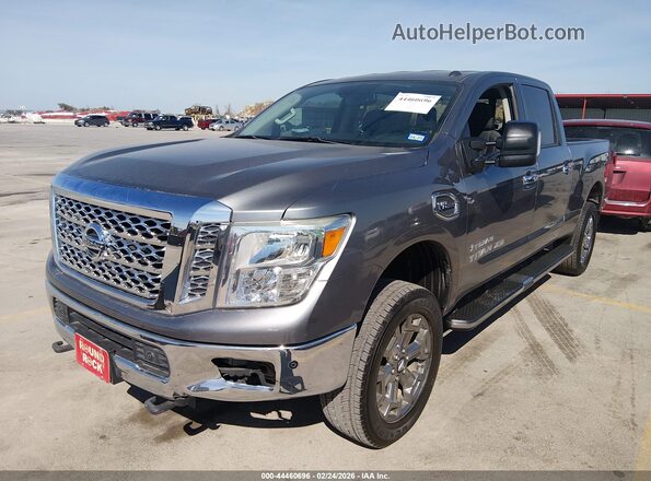 1N6AA1F44JN511973 2018 NISSAN TITAN XD Серебряный Передняя левая четверть