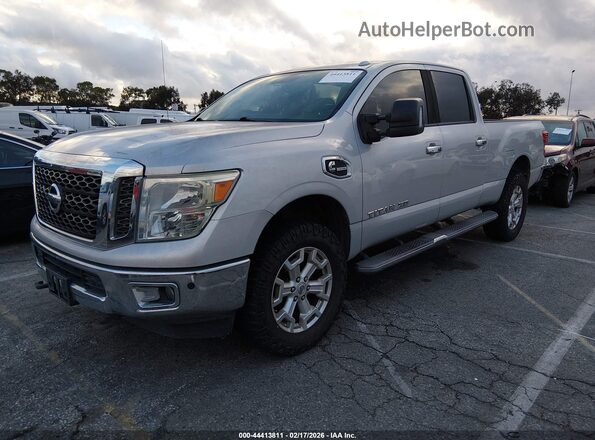 1N6BA1F2XGN500570 2016 NISSAN TITAN XD Серебряный Передняя левая четверть