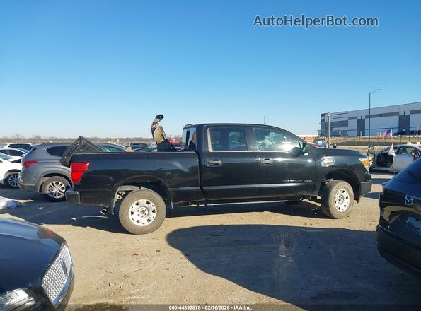 1N6BA1F3XJN519345 2018 NISSAN TITAN XD Черный Вид задней части салона