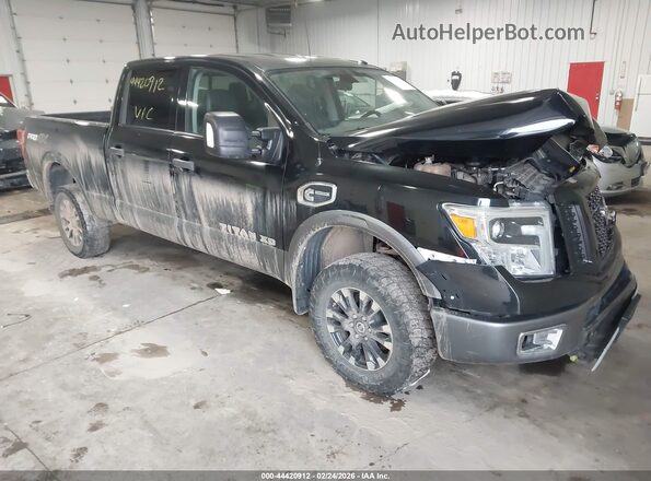 1N6BA1F41HN514893 2017 NISSAN TITAN XD Черный Передняя правая четверть