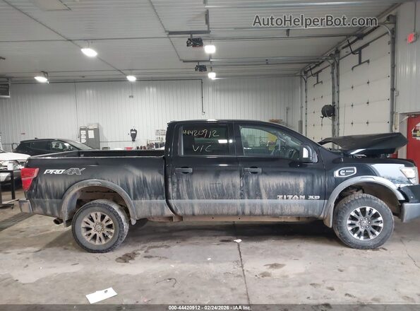 1N6BA1F41HN514893 2017 NISSAN TITAN XD Черный Вид задней части салона