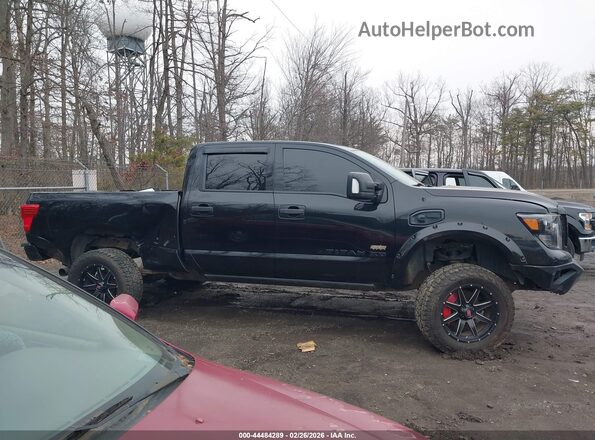 1N6BA1F46JN520520 2018 NISSAN TITAN XD Черный Вид задней части салона