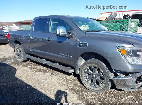 1N6BA1F47HN558896 2017 NISSAN TITAN XD Gray Vista interior trasera
