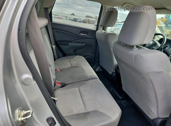 2HKRM3H45GH559092 2016 HONDA CRV Silver Widok wnętrza z tyłu