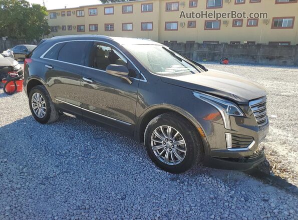 1GYKNARS0KZ205184 2019 CADILLAC XT5 Серый Вид спереди