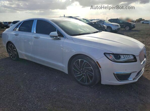 3LN6L5E92LR610827 2020 LINCOLN MKZ Кремовый Вид салона спереди