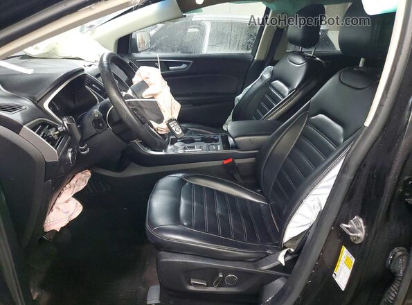 2FMPK3J94KBB74366 2019 FORD EDGE Black Front interior view