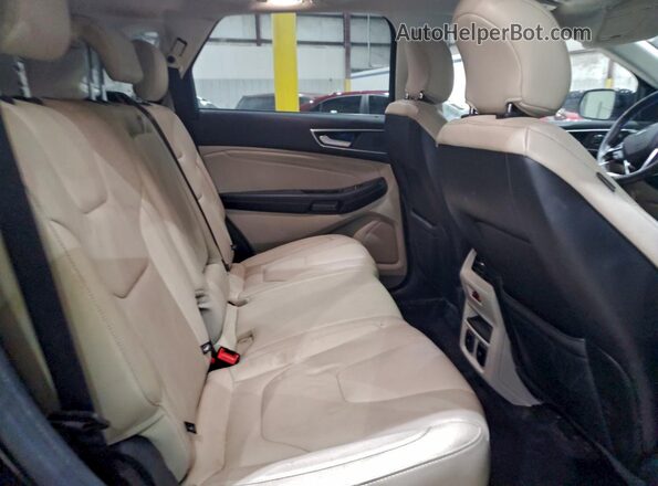 2FMPK3K94KBB04607 2019 FORD EDGE Черный Вид задней части салона