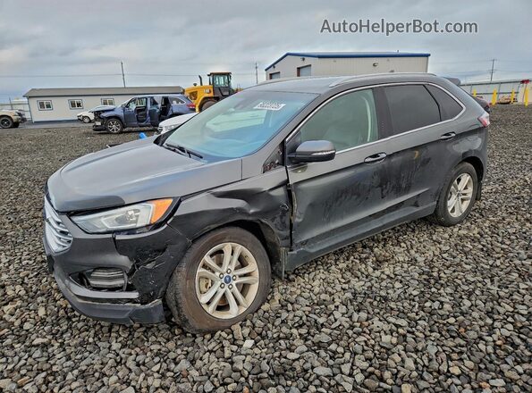 2FMPK4J93KBC28231 2019 FORD EDGE Gray Vista tres cuartos delantera izquierda