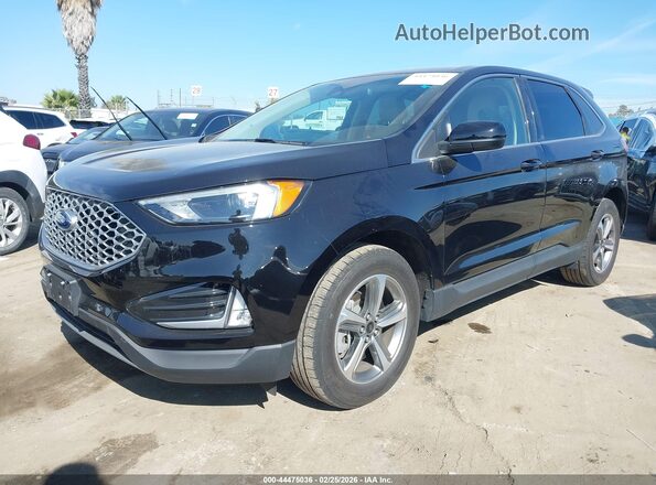 2FMPK4J93RBA07450 2024 FORD EDGE Black Vista tres cuartos delantera izquierda