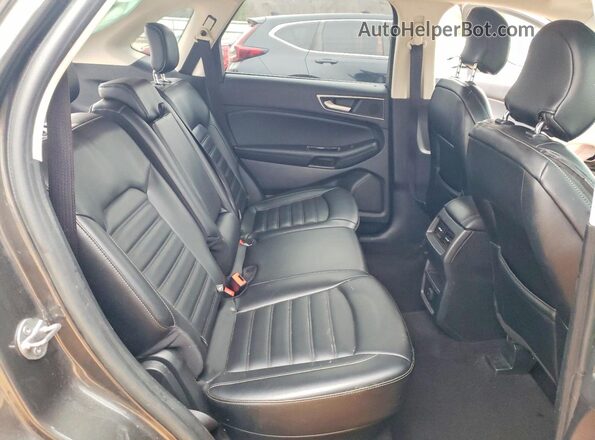 2FMPK4J95KBC24777 2019 FORD EDGE Серый Вид задней части салона