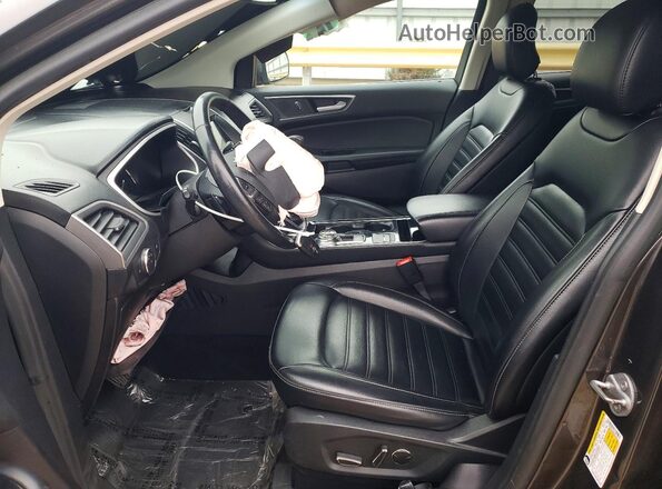 2FMPK4J95KBC24777 2019 FORD EDGE Серый Вид салона спереди