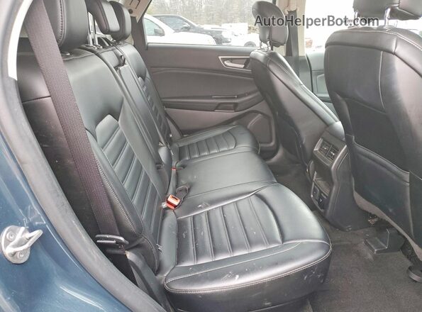 2FMPK4J98KBC56574 2019 FORD EDGE Синий Вид задней части салона