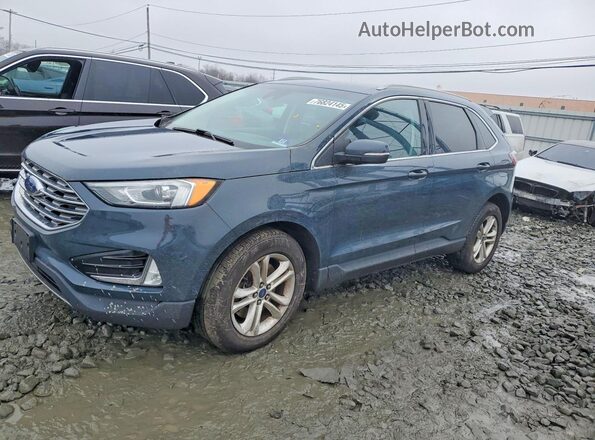 2FMPK4J98KBC56574 2019 FORD EDGE Синий Передняя левая четверть