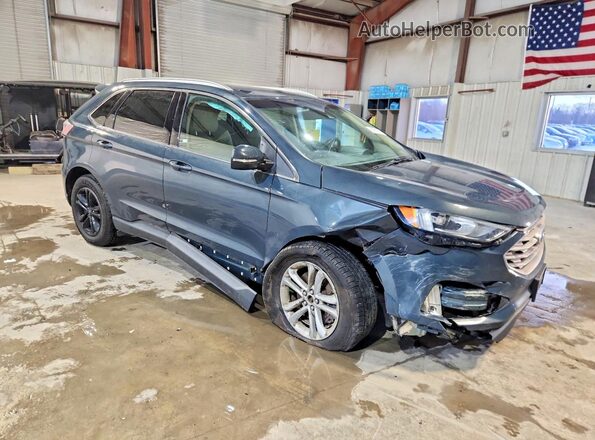 2FMPK4J9XKBB43399 2019 FORD EDGE Charcoal Front right