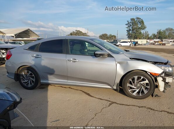 2HGFC2F72HH545465 2017 HONDA CIVIC Серебряный Вид задней части салона
