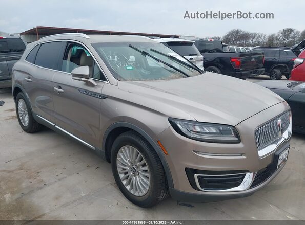 2LMPJ6J96KBL42159 2019 LINCOLN NAUTILUS Желто-коричневый Передняя правая четверть