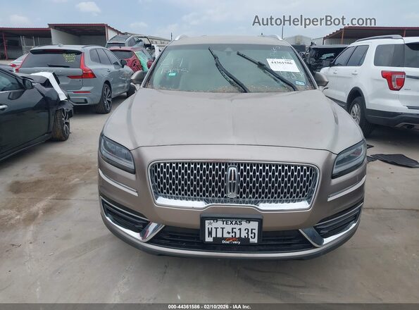 2LMPJ6J96KBL42159 2019 LINCOLN NAUTILUS Желто-коричневый Вид щитка приборов