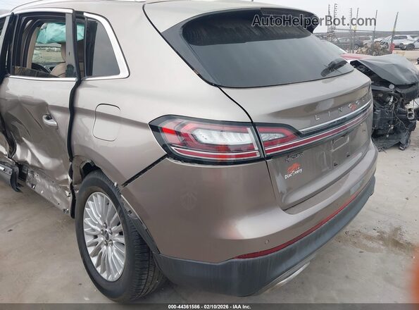 2LMPJ6J96KBL42159 2019 LINCOLN NAUTILUS Желто-коричневый 