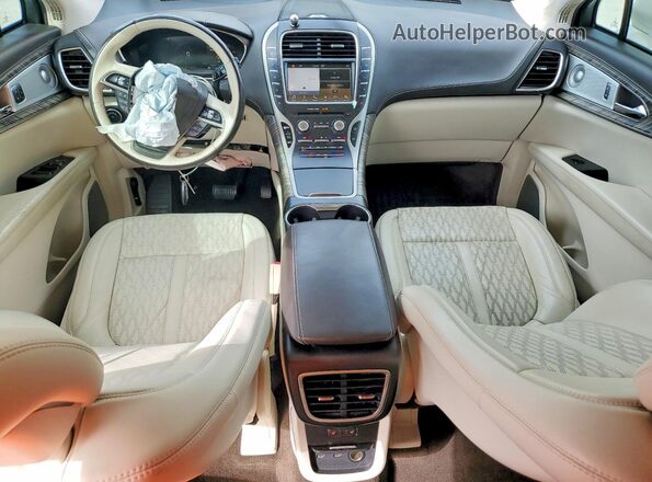 2LMPJ7J98KBL36420 2019 LINCOLN NAUTILUS Белый Вид панели приборов