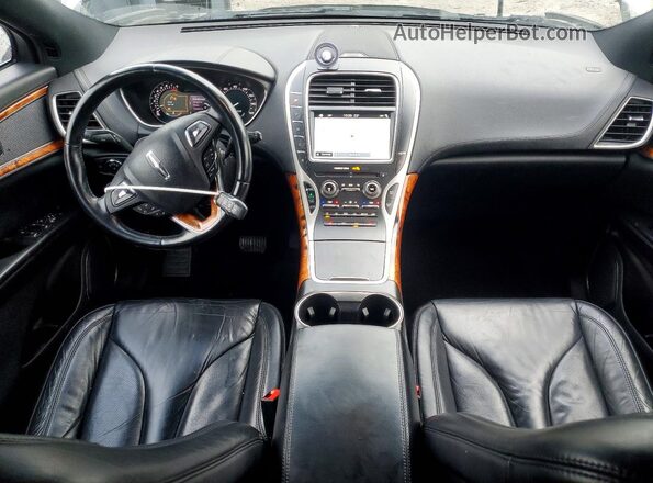 2LMPJ8KR9HBL28811 2017 LINCOLN MKX Желто-коричневый Вид панели приборов