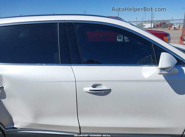 2LMTJ6KP9GBL22829 2016 LINCOLN MKX Белый Вид задней части салона