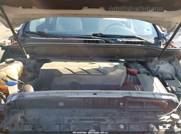 2LMTJ8LP9GBL69563 2016 LINCOLN MKX Серебряный Вид сзади