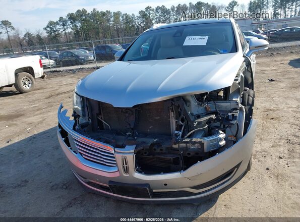 2LMTJ8LP9GBL69563 2016 LINCOLN MKX Серебряный Вид щитка приборов