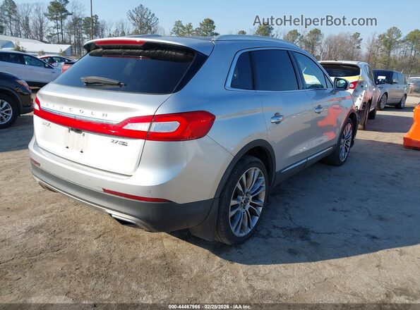 2LMTJ8LP9GBL69563 2016 LINCOLN MKX Серебряный Задняя правая четверть