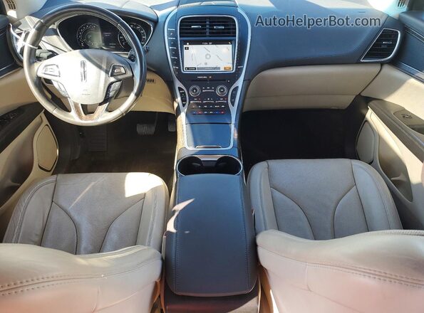 2LMTJ8LR7GBL57719 2016 LINCOLN MKX Белый Вид панели приборов