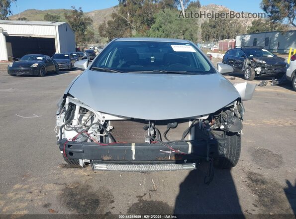 2T1BURHE0KC131407 2019 TOYOTA LL Серебряный Вид задней части салона