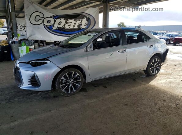 2T1BURHE3JC059083 2018 TOYOTA LL Silver Vista tres cuartos delantera izquierda