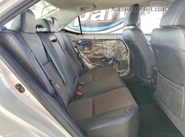 2T1BURHE3JC059083 2018 TOYOTA LL Silver Vista de los asientos traseros