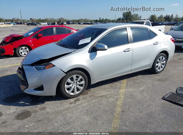 2T1BURHE5KC143875 2019 TOYOTA LL Серебряный Передняя левая четверть