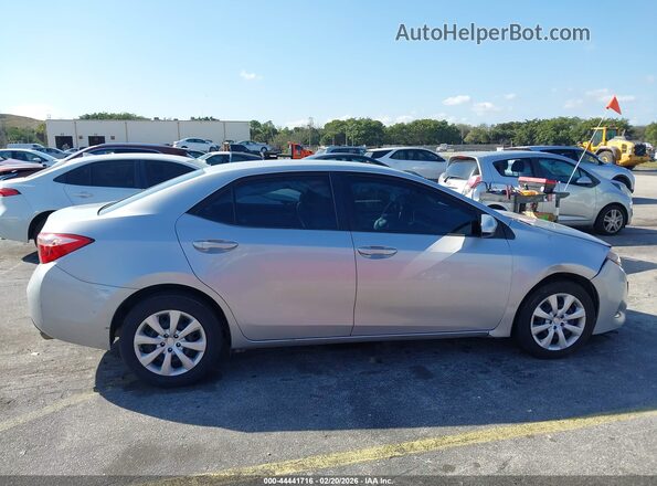2T1BURHE5KC143875 2019 TOYOTA LL Серебряный Вид задней части салона