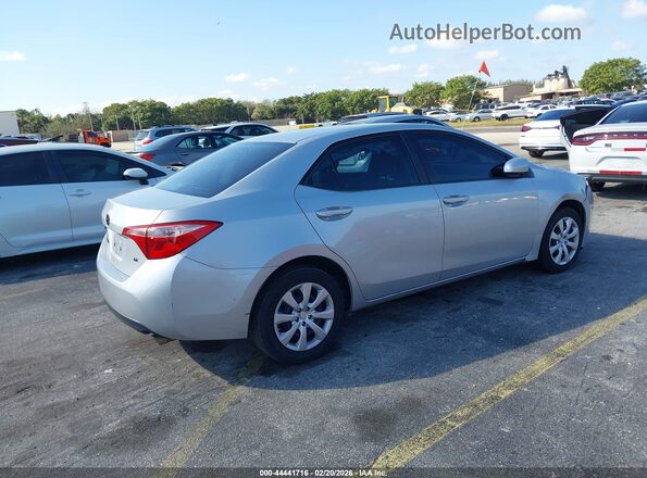 2T1BURHE5KC143875 2019 TOYOTA LL Серебряный Задняя правая четверть