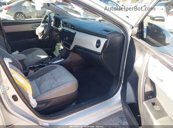 2T1BURHE5KC143875 2019 TOYOTA LL Серебряный Вид салона спереди