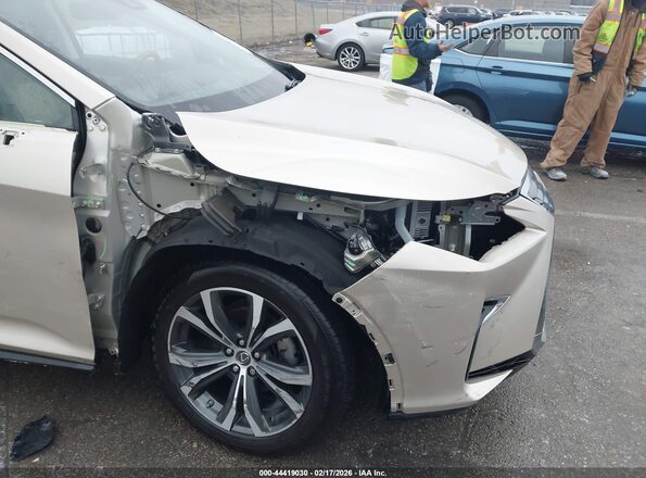 2T2BGMCA6KC037607 2019 LEXUS RX 450H Серебряный Вид спереди