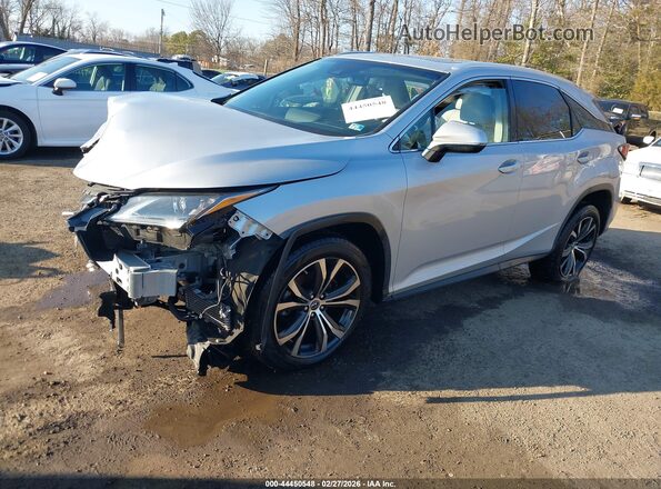 2T2BZMCA3KC206055 2019 LEXUS RX 350 Серебряный Передняя левая четверть