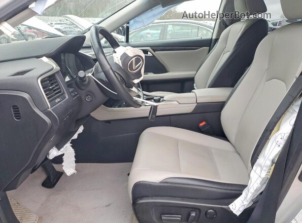 2T2BZMCA3KC209103 2019 LEXUS RX Серебряный Вид салона спереди