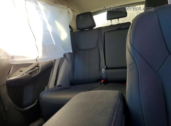 2T2GGCEZ4TC096563 2026 LEXUS NX Silver Vista de los asientos traseros