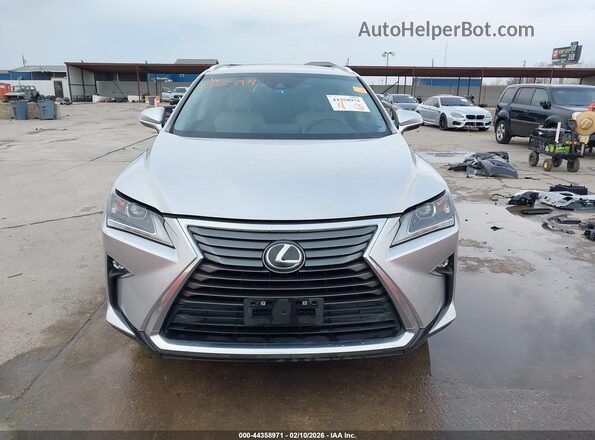 2T2ZZMCA5JC110280 2018 LEXUS RX 350 Silver Widok wnętrza z tyłu