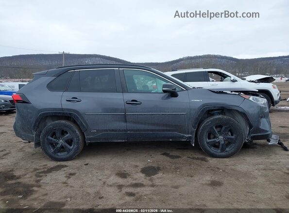 2T3E6RFV2MW011367 2021 TOYOTA RAV4 HYBRID Gray Vista interior trasera