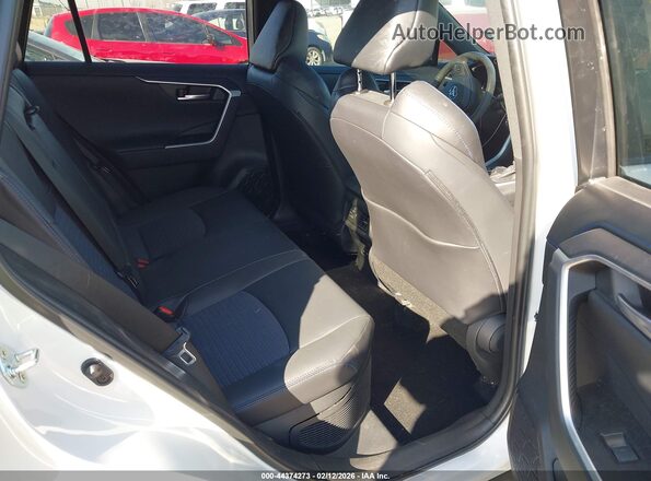 2T3E6RFV3PW041661 2023 TOYOTA RAV4 HYBRID White Vista de la etiqueta del VIN