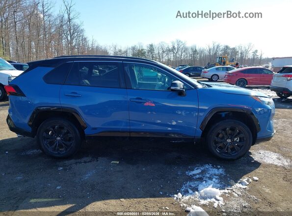 2T3E6RFV3PW043572 2023 TOYOTA RAV4 HYBRID Синий Вид задней части салона