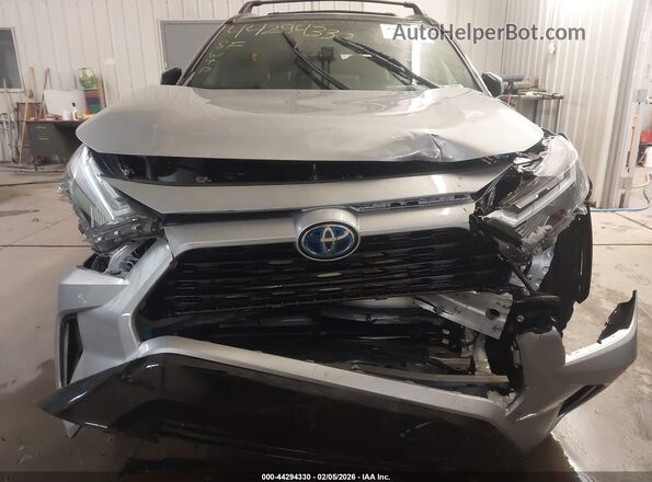 2T3E6RFV6RW078061 2024 TOYOTA RAV4 HYBRID Серебряный Вид задней части салона