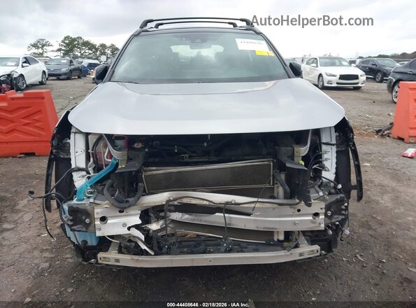 2T3EWRFV0KW045689 2019 TOYOTA RAV4 HYBRID Серебряный Вид задней части салона